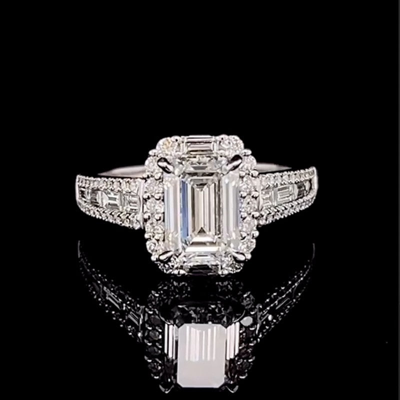 Luxurious Halo Emerald Cut Engagement Ring In Sterling Silver