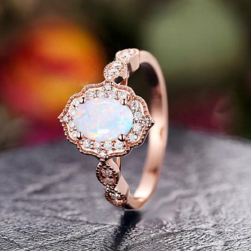 Vintage Rose Gold Oval Cut Opal Engagement Ring In Sterling Silver
