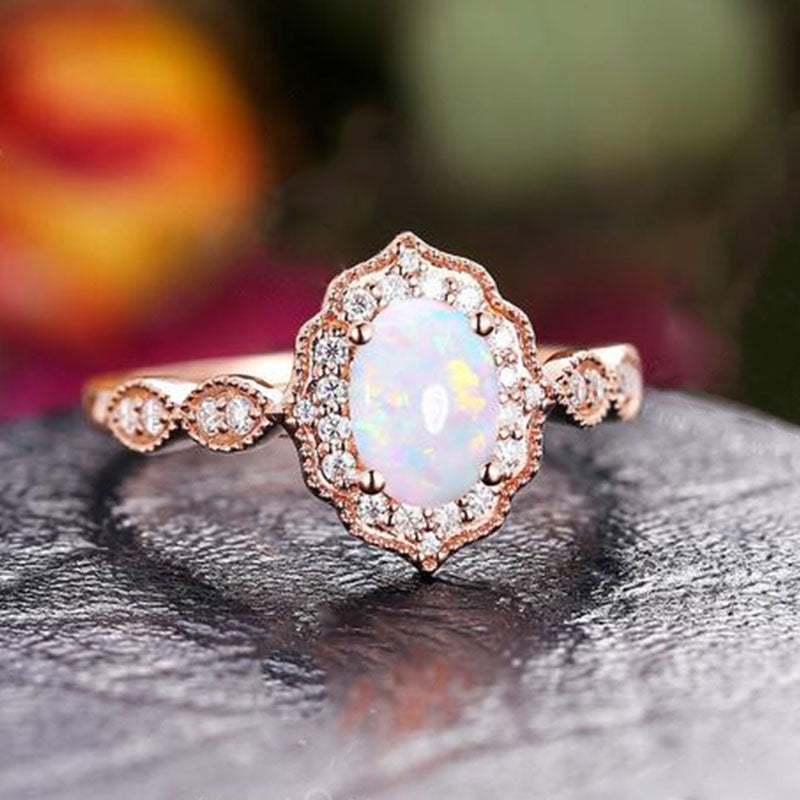 Vintage Rose Gold Oval Cut Opal Engagement Ring In Sterling Silver
