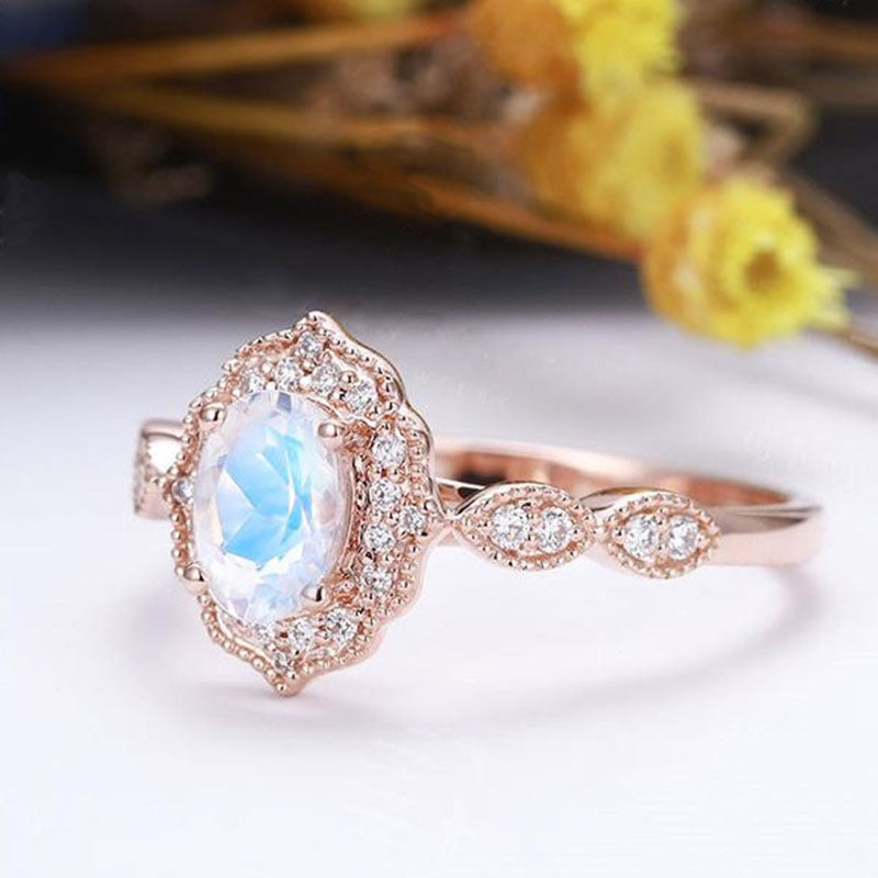 Rose Gold Oval Cut Moonstone Engagement Ring In Sterling Silver