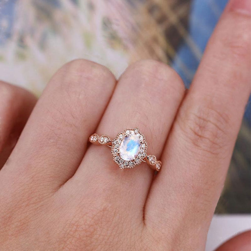 Rose Gold Oval Cut Moonstone Engagement Ring In Sterling Silver