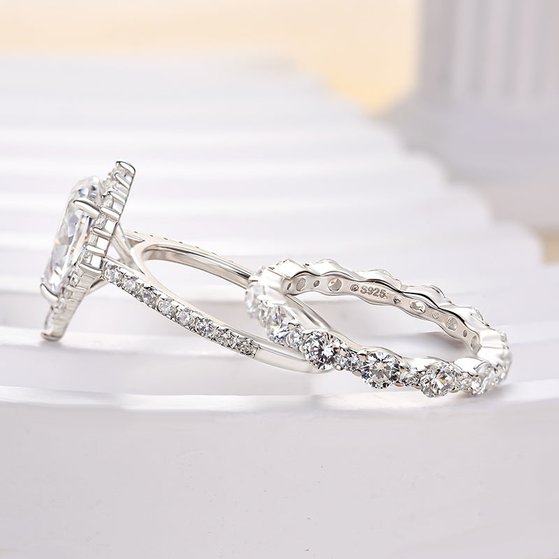 Lovely Halo Pear Cut Bridal Ring Set In Sterling Silver