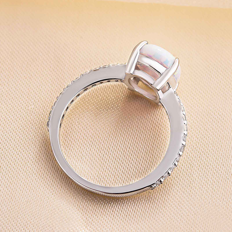Elegant Oval Cut Opal Stone Engagement Ring In Sterling Silver