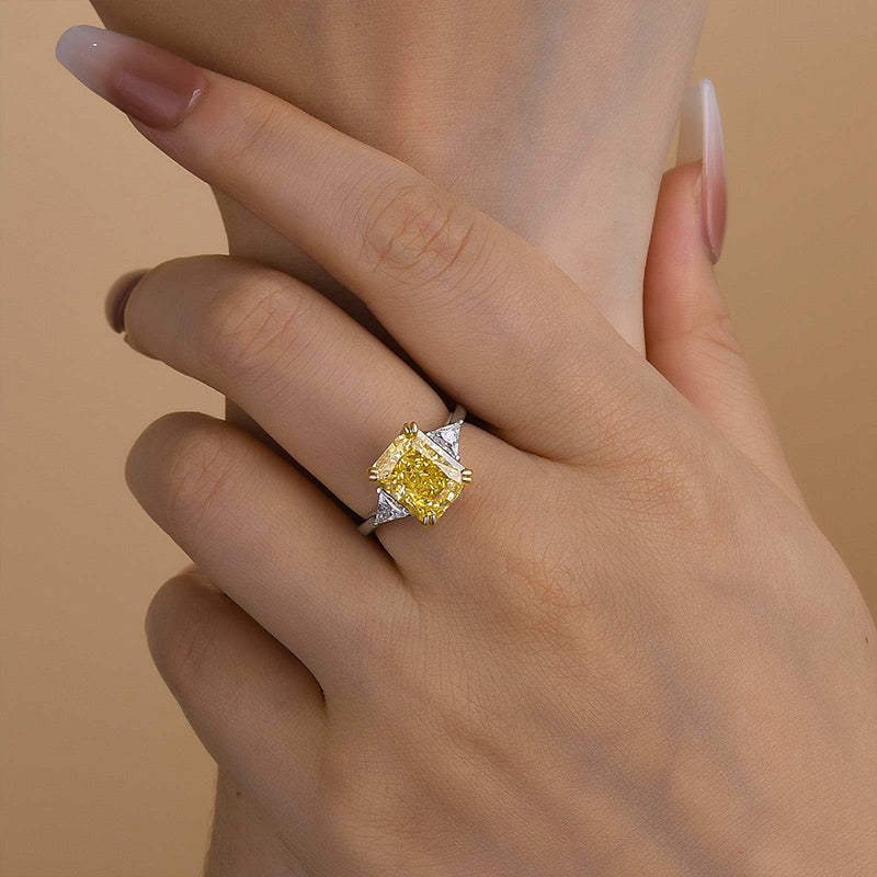 Radiant Cut Yellow Stone Two-Tone Engagement Ring With Triangle Cut Side-stones
