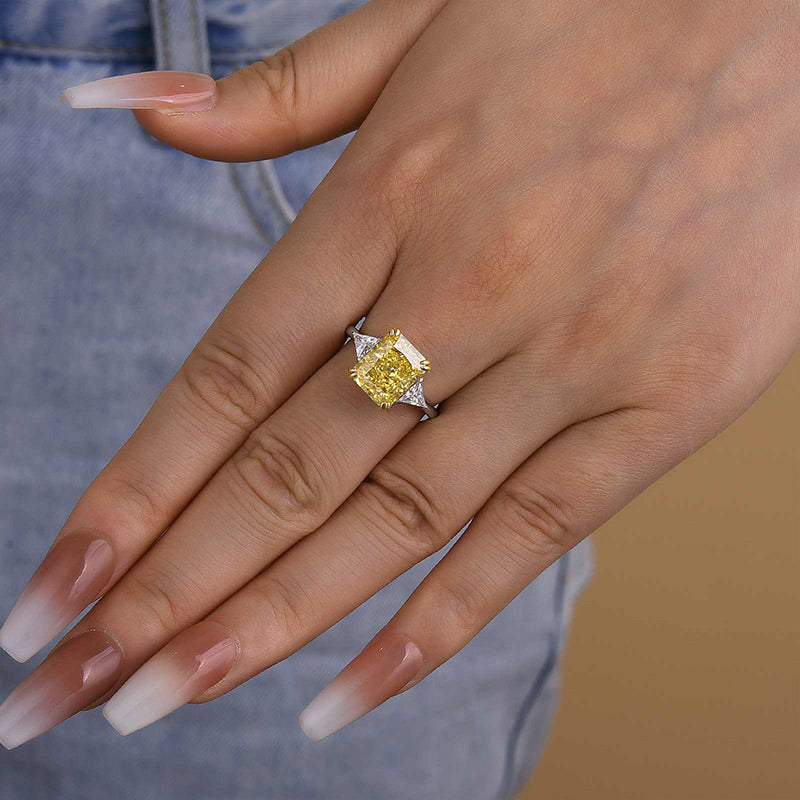 Radiant Cut Yellow Stone Two-Tone Engagement Ring With Triangle Cut Side-stones