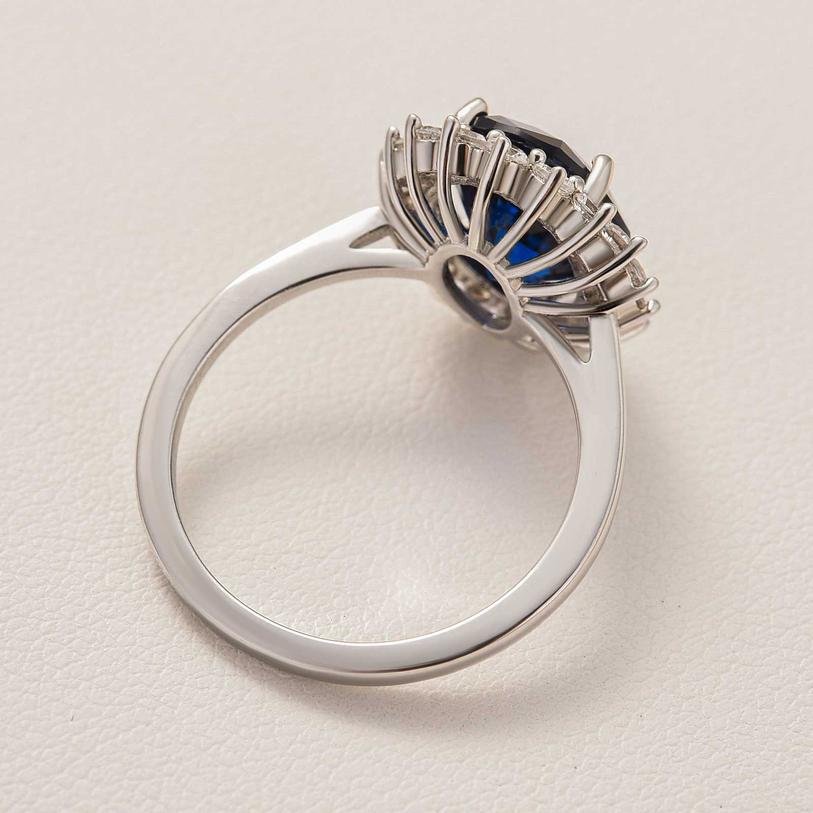 Luxurious Halo Oval Cut Blue Sapphire Engagement Ring In Sterling Silver