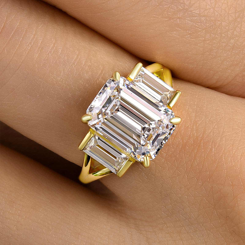 Noble Split Shank Three Stone Emerald Cut Engagement Ring