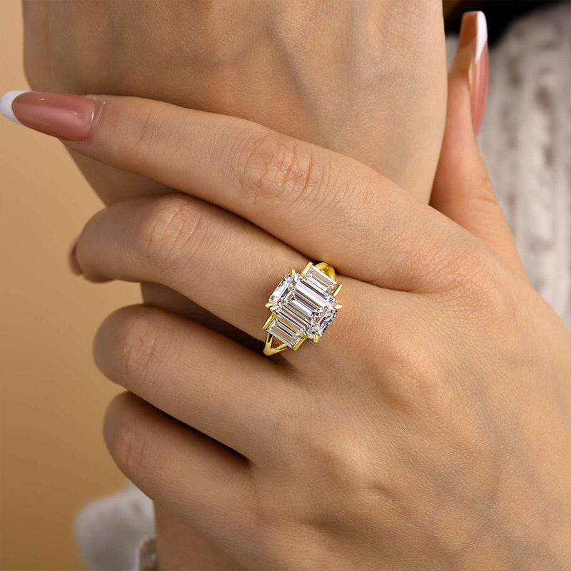 Noble Split Shank Three Stone Emerald Cut Engagement Ring
