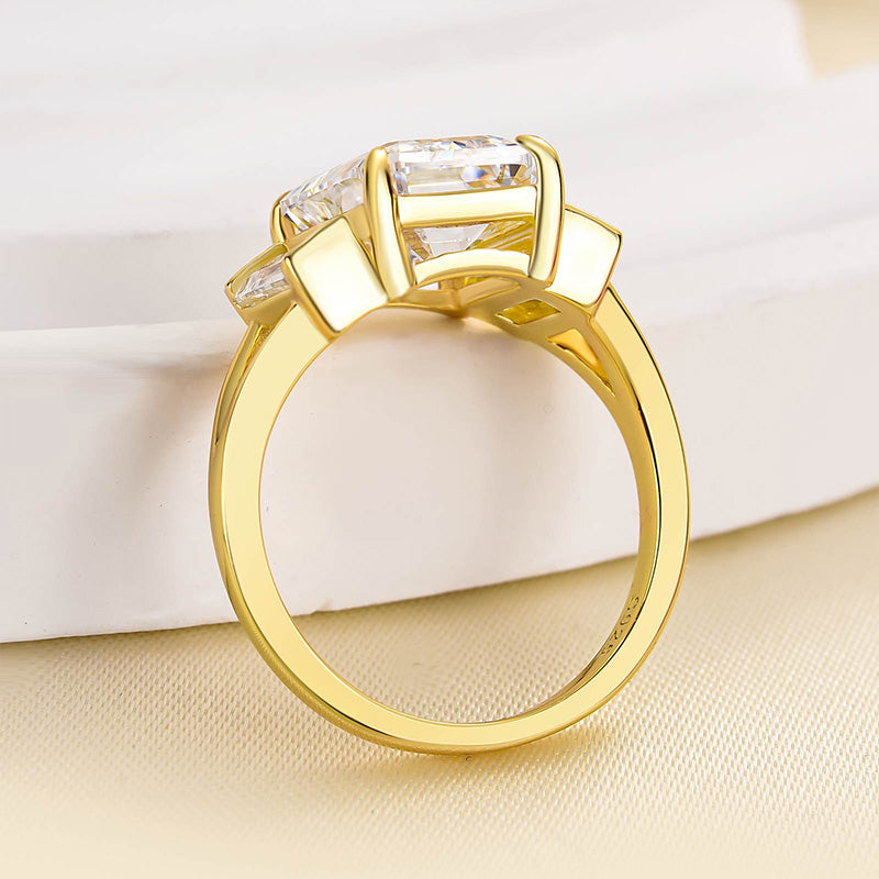 Noble Split Shank Three Stone Emerald Cut Engagement Ring