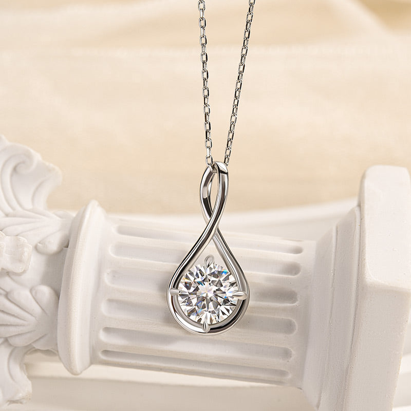 Moissanite Elegant Twist Round Cut Pendant Necklace In Sterling Silver