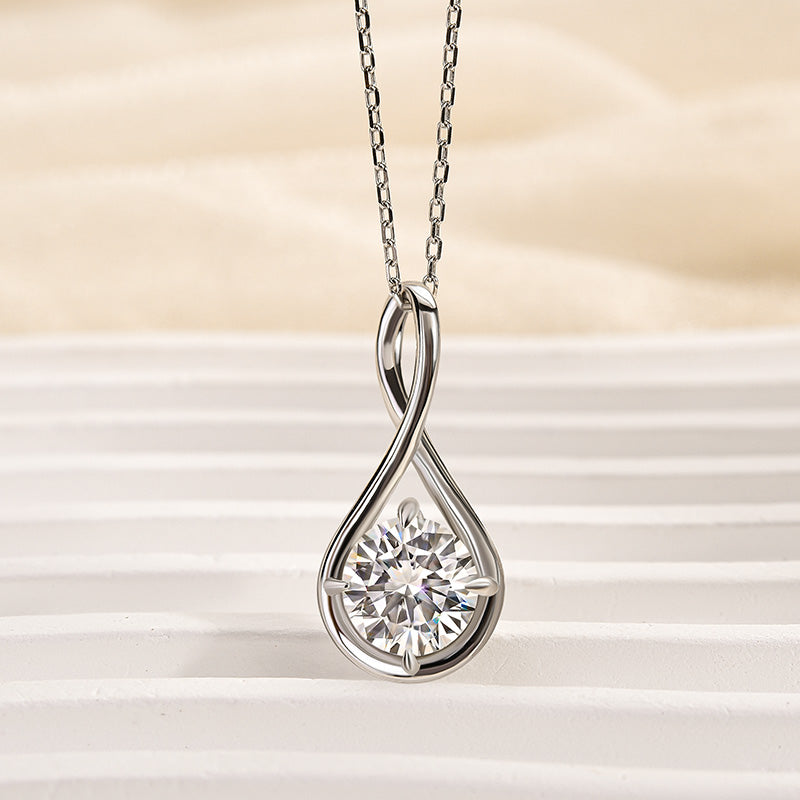 Moissanite Elegant Twist Round Cut Pendant Necklace In Sterling Silver