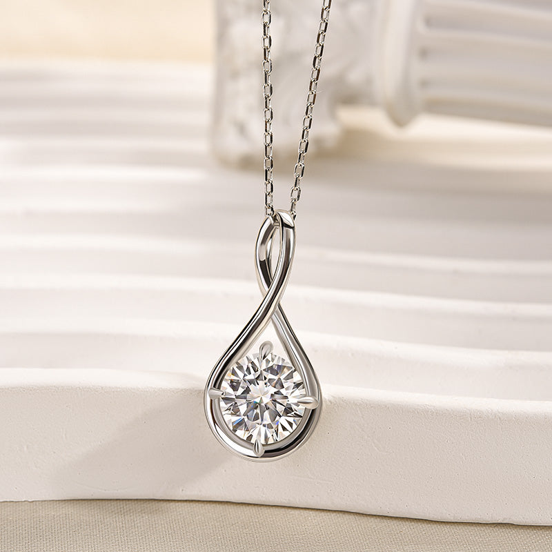 Moissanite Elegant Twist Round Cut Pendant Necklace In Sterling Silver
