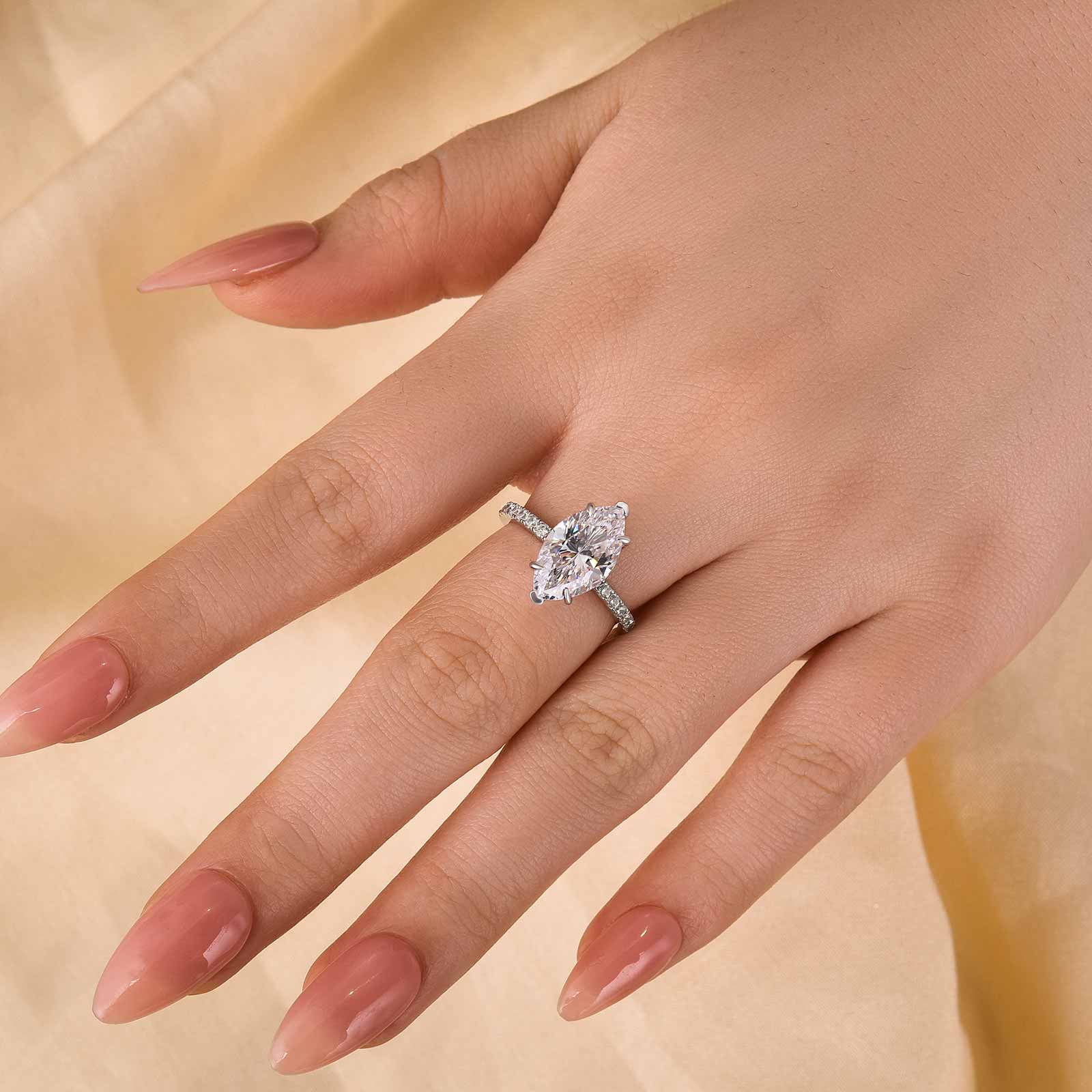 Exclusive Marquise Cut Engagement Ring In Sterling Silver
