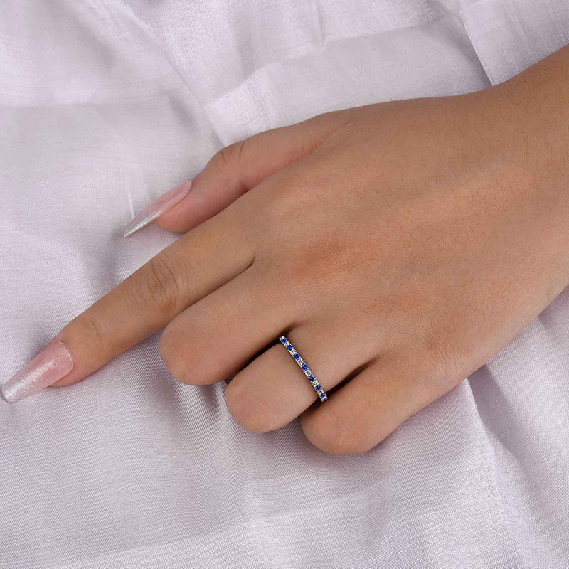 Half Eternity Blue And White Sapphire Wedding Band For Women In Sterling Silver