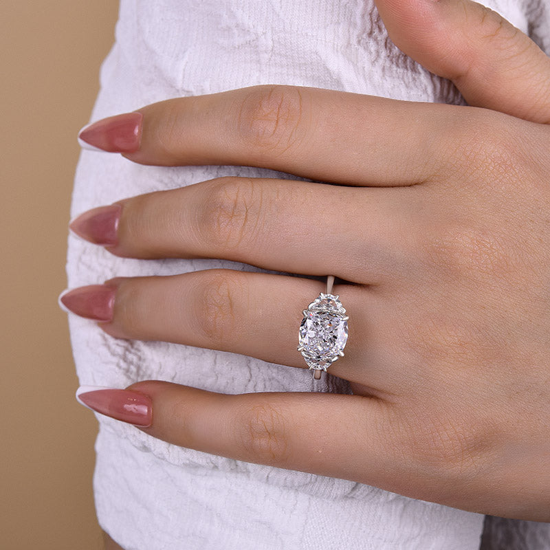 Elegant Cushion Cut Three Stone Engagement Ring In Sterling Silver