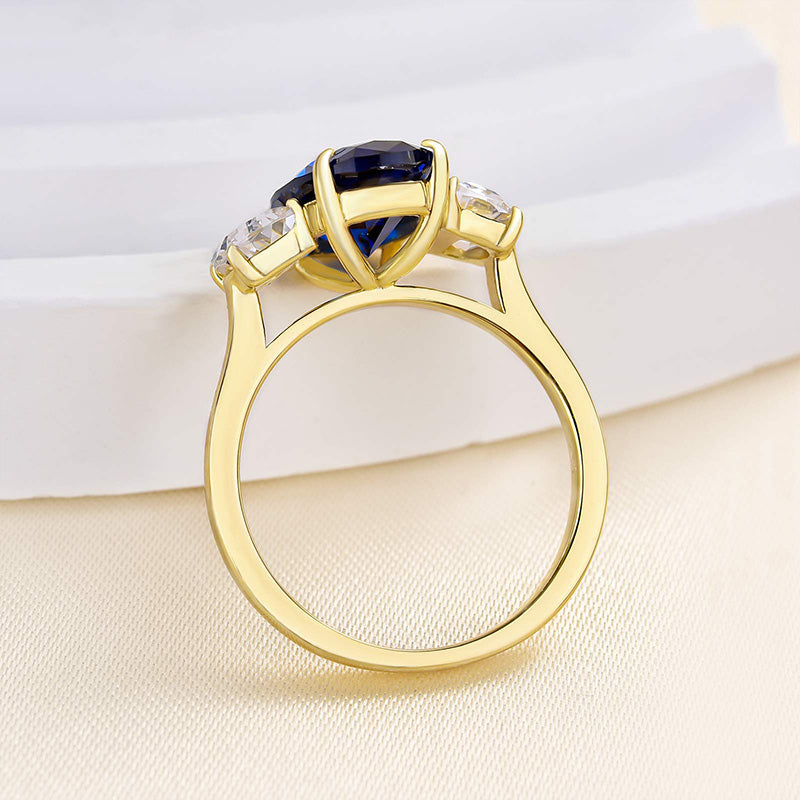 Yellow Gold 3.5 Carat Blue Sapphire Oval Cut Three Stone Engagement Ring