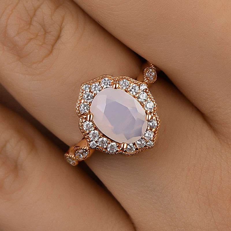 Rose Gold Oval Cut Moonstone Engagement Ring In Sterling Silver