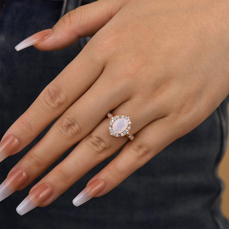 Rose Gold Oval Cut Moonstone Engagement Ring In Sterling Silver
