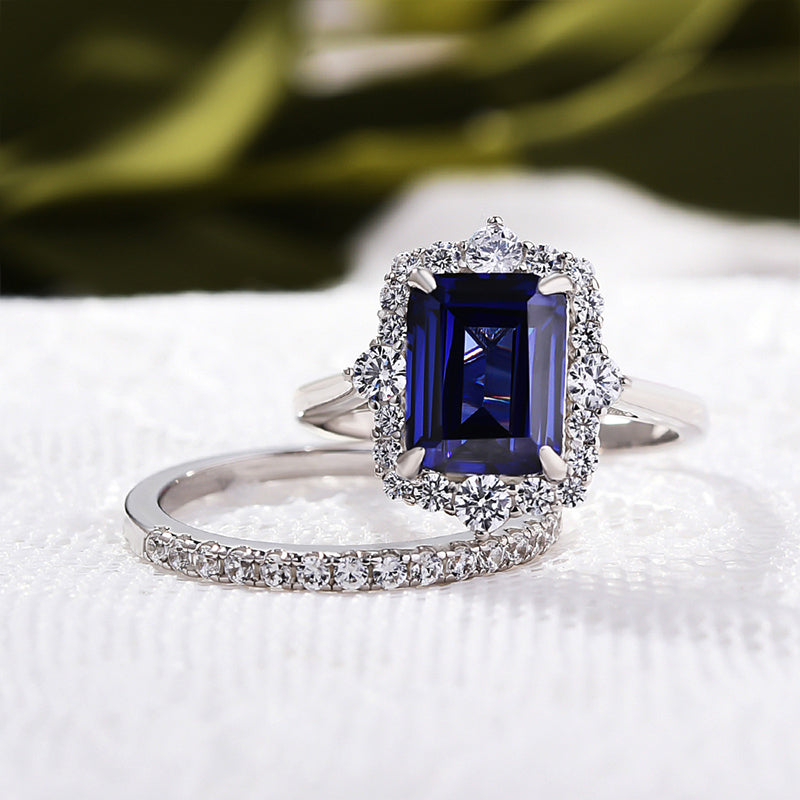 Exclusive Halo Blue Sapphire Emerald Cut Wedding Ring Sets In Sterling Silver