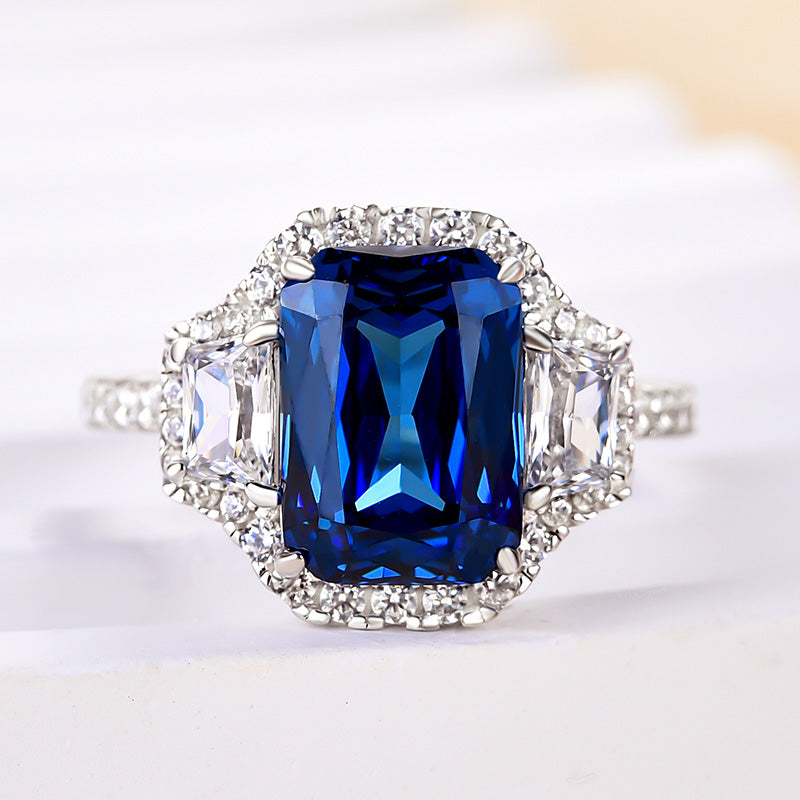 Gorgeous Halo Blue Sapphire Radiant Cut Three Stone Engagement Ring In Sterling Silver