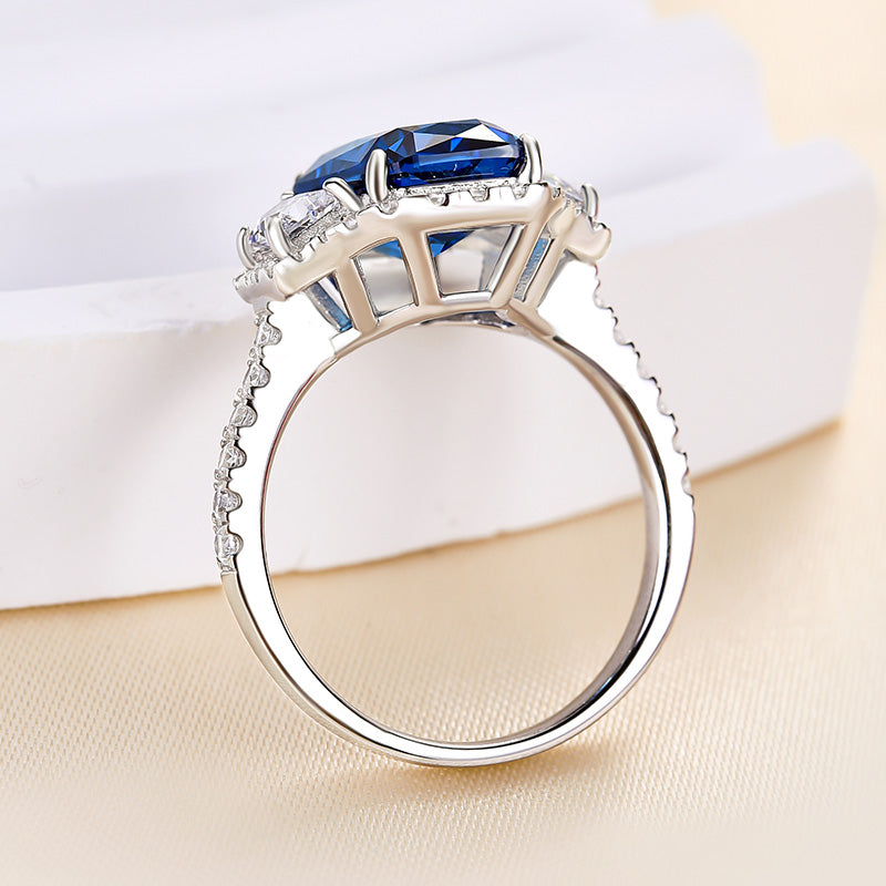 Gorgeous Halo Blue Sapphire Radiant Cut Three Stone Engagement Ring In Sterling Silver