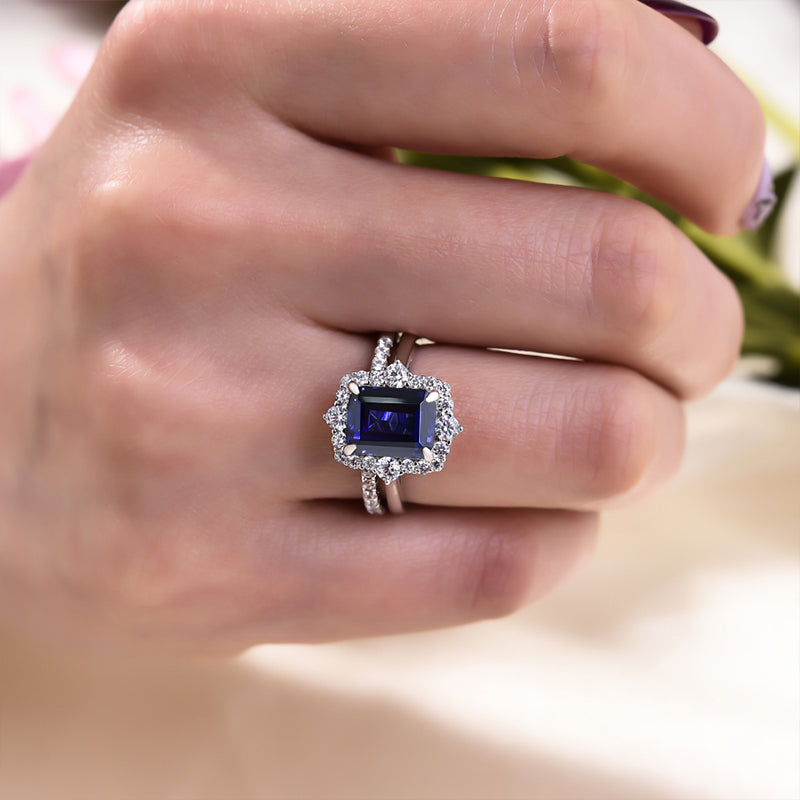 Exclusive Halo Blue Sapphire Emerald Cut Wedding Ring Sets In Sterling Silver