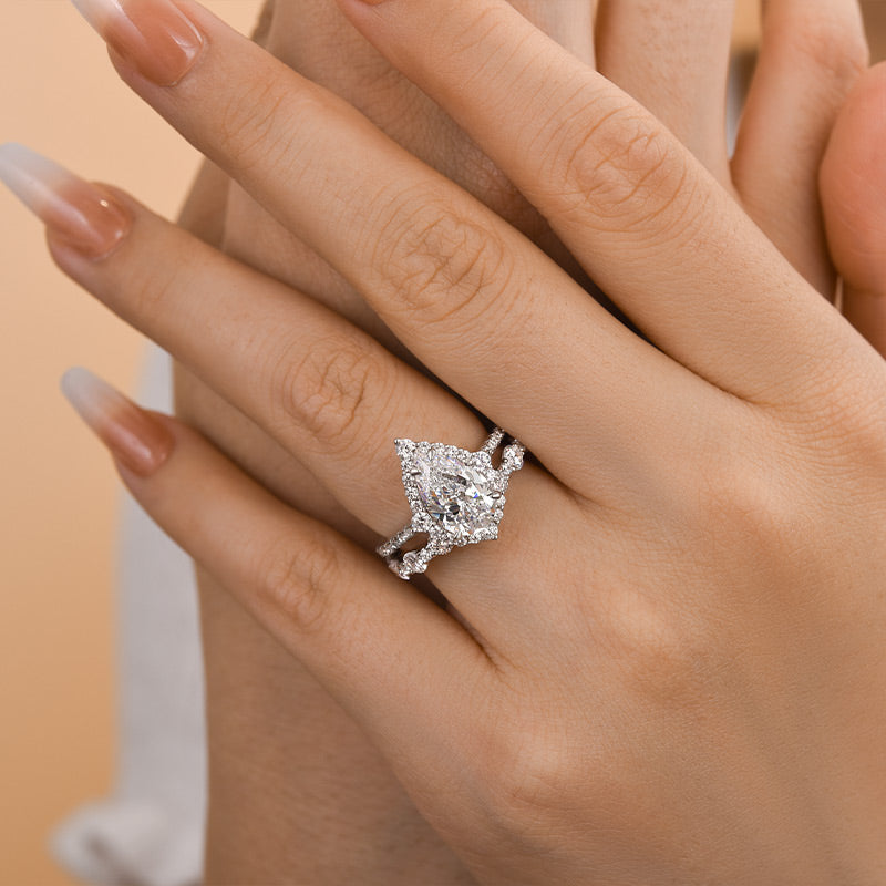 Lovely Halo Pear Cut Bridal Ring Set In Sterling Silver