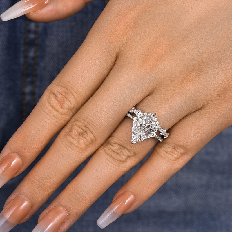 Lovely Halo Pear Cut Bridal Ring Set In Sterling Silver