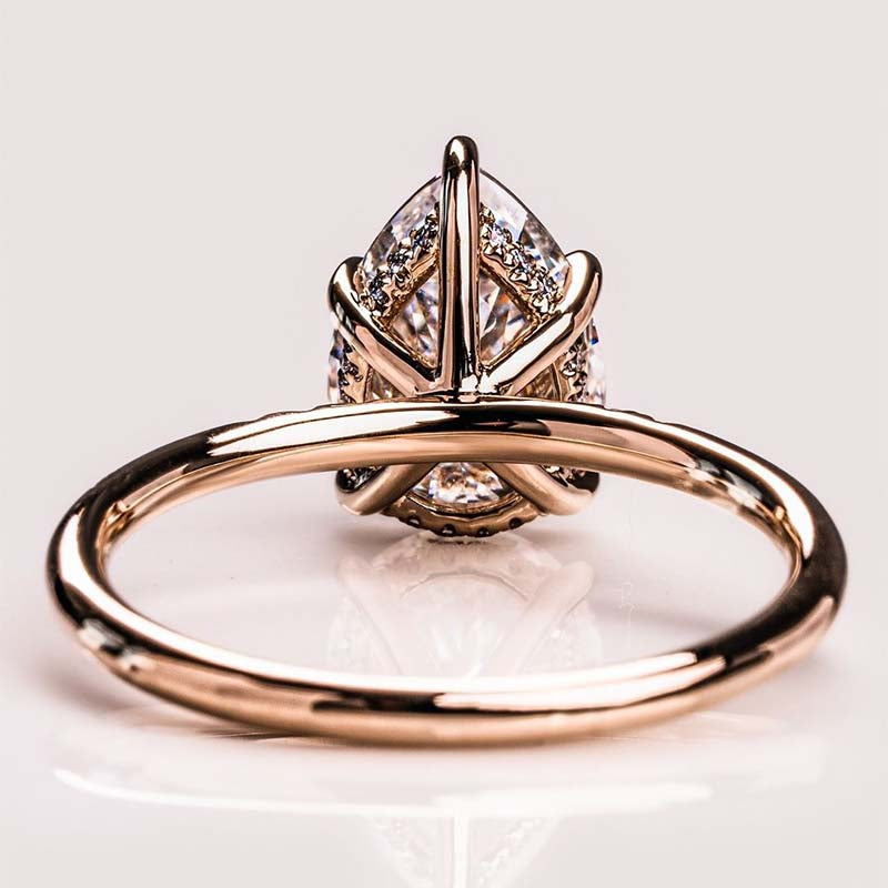 Elegant Rose Gold Pear Cut Engagement Ring In Sterling Silver