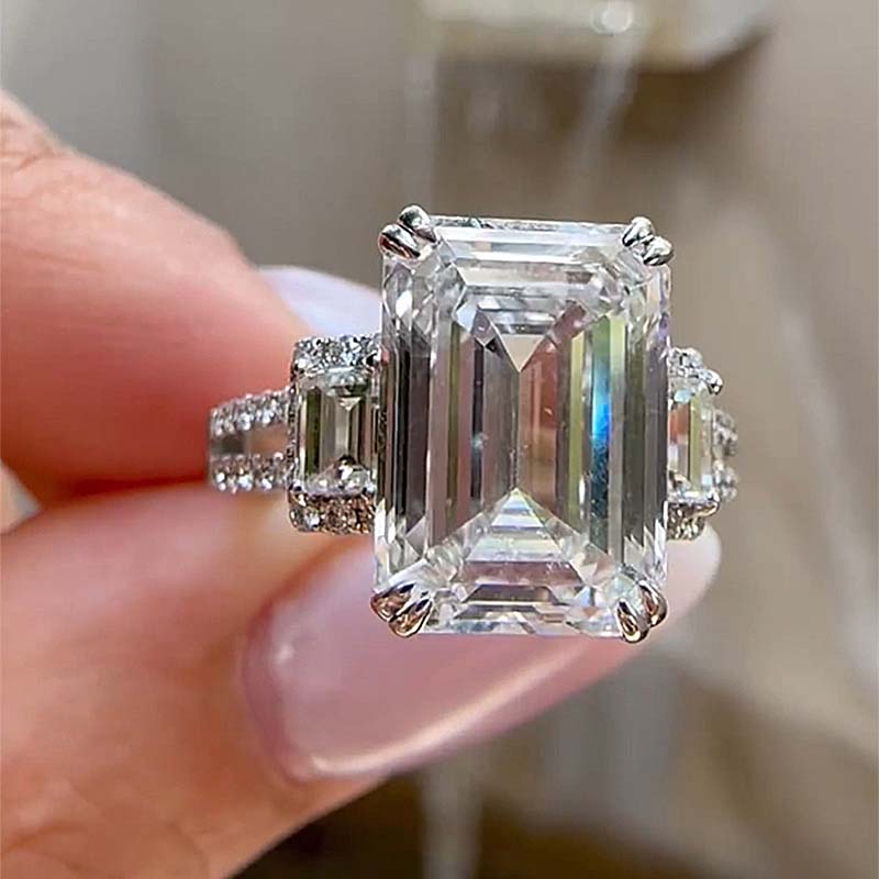 Lovely Split Shank Emerald Cut Three Stone Engagement Ring