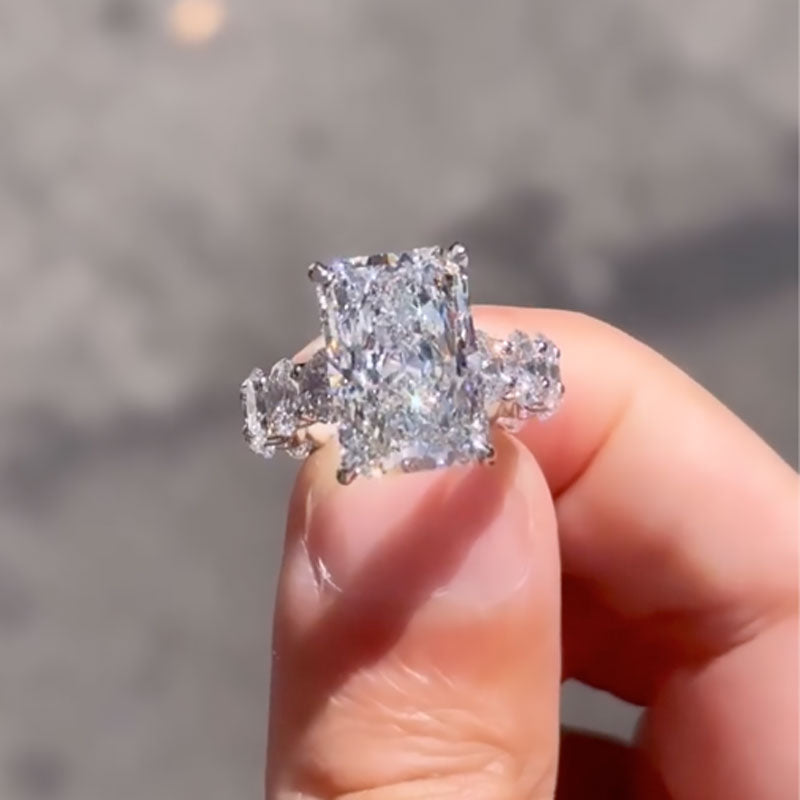 Honorable 7.0Ct Radiant Cut Engagement Ring with Oval Cut Band