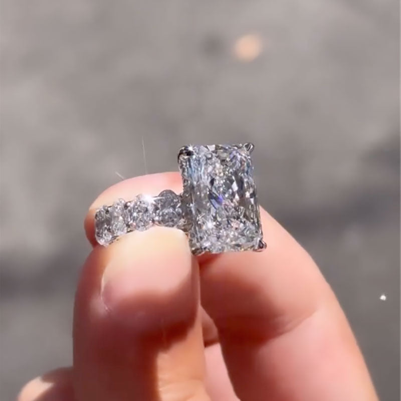 Honorable 7.0Ct Radiant Cut Engagement Ring with Oval Cut Band