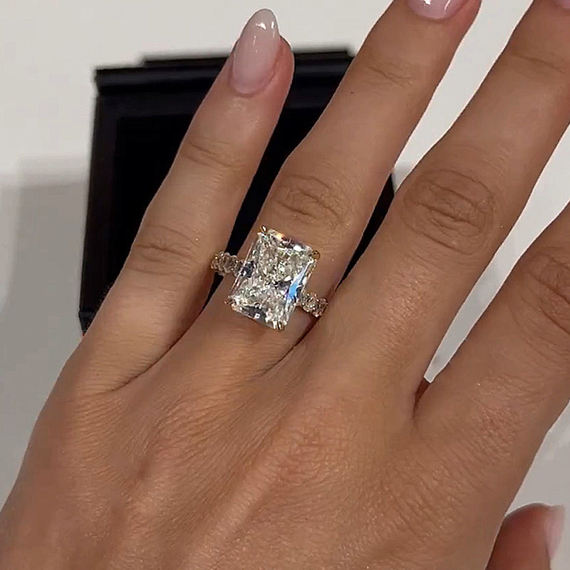 Honorable 7.0Ct Radiant Cut Engagement Ring with Oval Cut Band