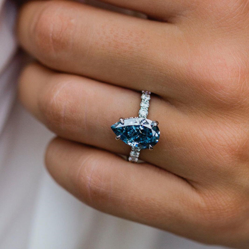Unique Pear Cut Blue Sapphire Engagement Ring In Sterling Silver