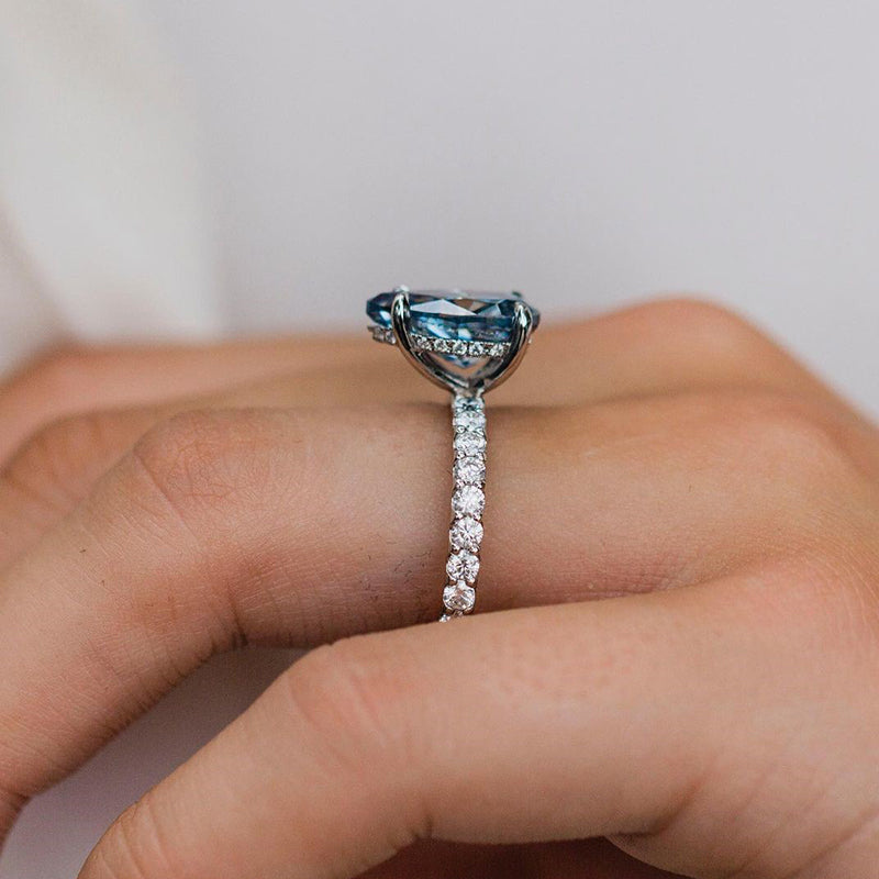 Unique Pear Cut Blue Sapphire Engagement Ring In Sterling Silver