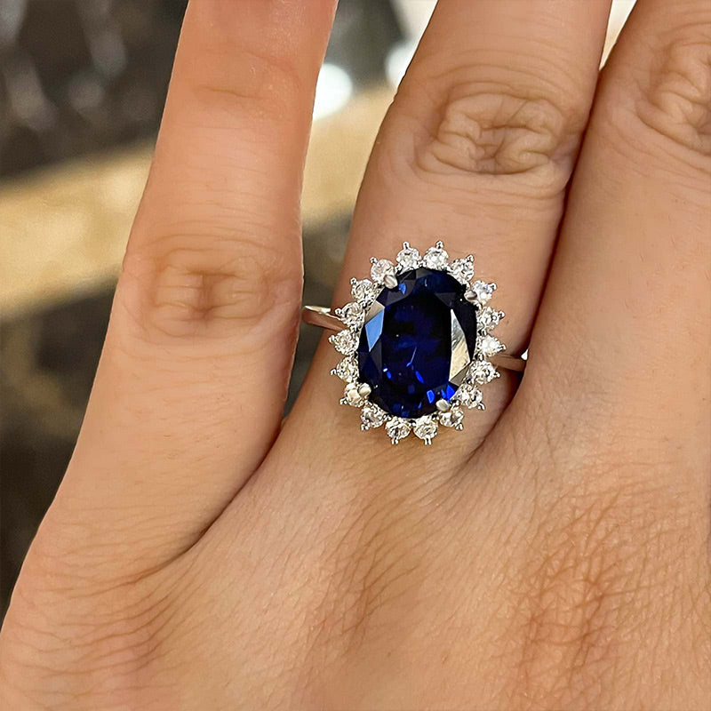 Luxurious Halo Oval Cut Blue Sapphire Engagement Ring In Sterling Silver