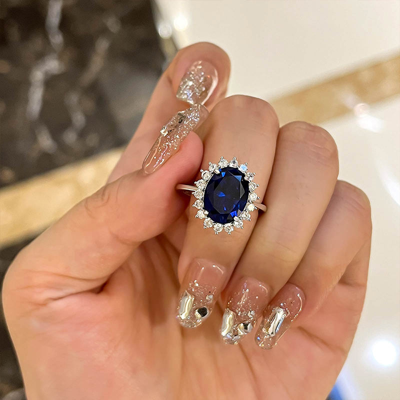 Luxurious Halo Oval Cut Blue Sapphire Engagement Ring In Sterling Silver