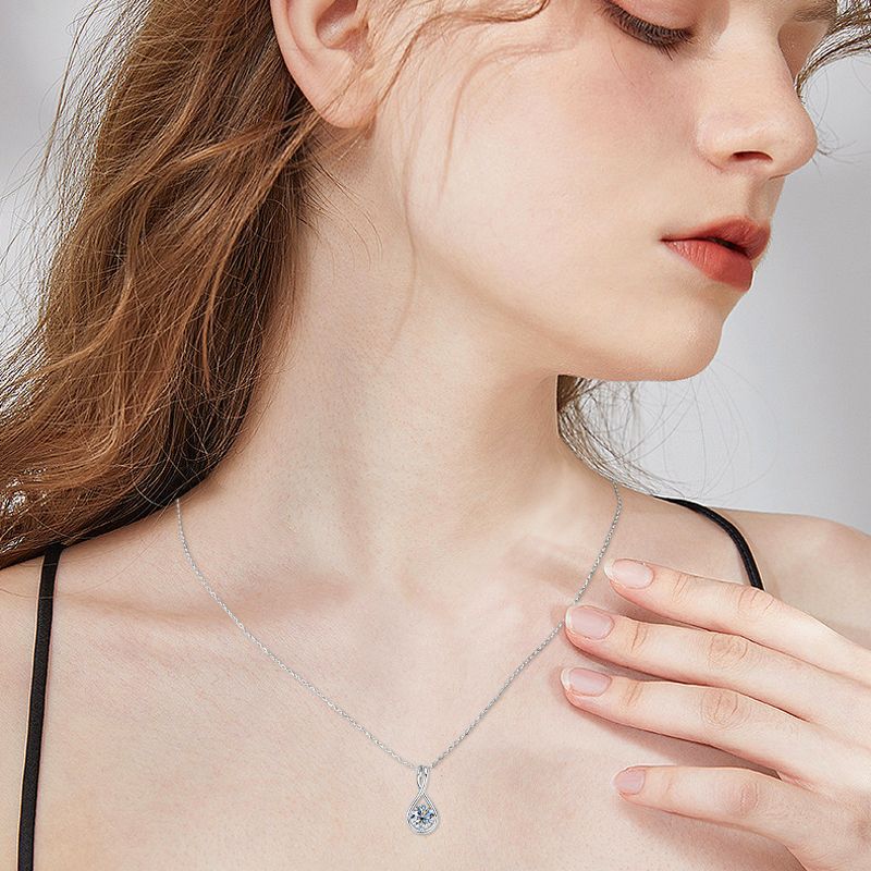Moissanite Elegant Twist Round Cut Pendant Necklace In Sterling Silver