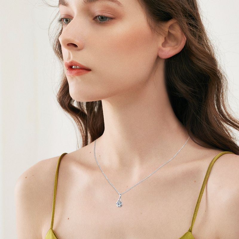 Moissanite Elegant Twist Round Cut Pendant Necklace In Sterling Silver