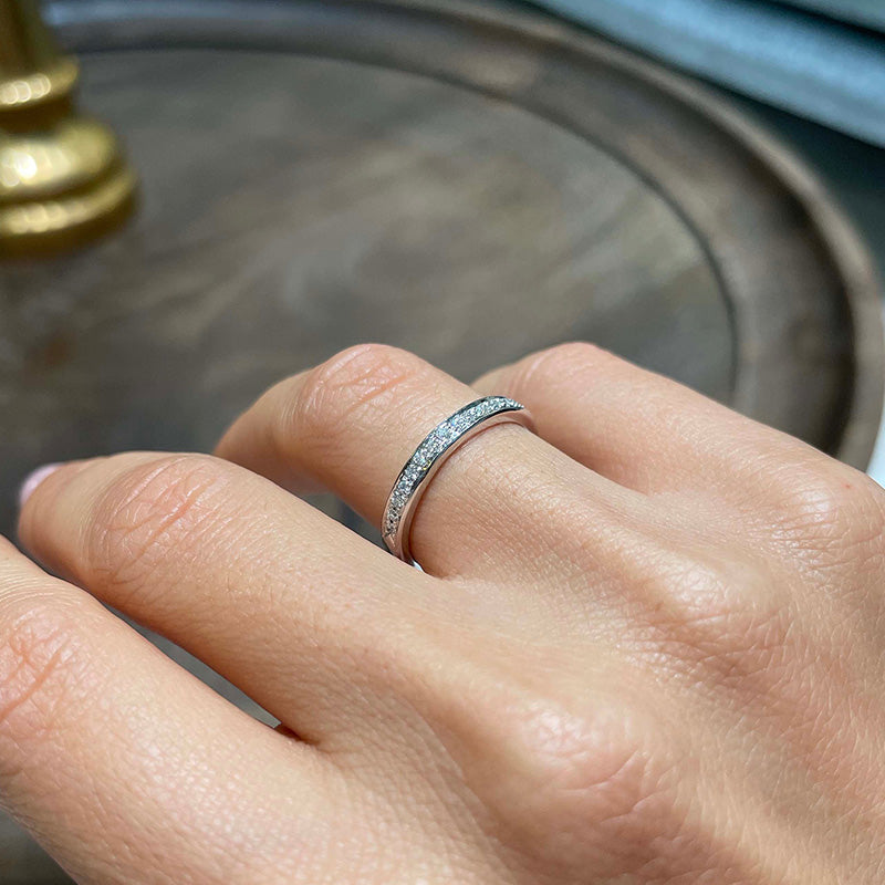 Exclusive Channel Set Curved Half Wedding Band In Sterling Silver