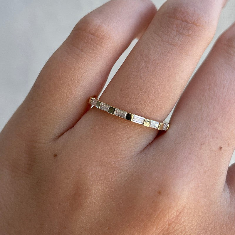 Noble Emerald Cut Yellow Gold Half Wedding Band In Sterling Silver