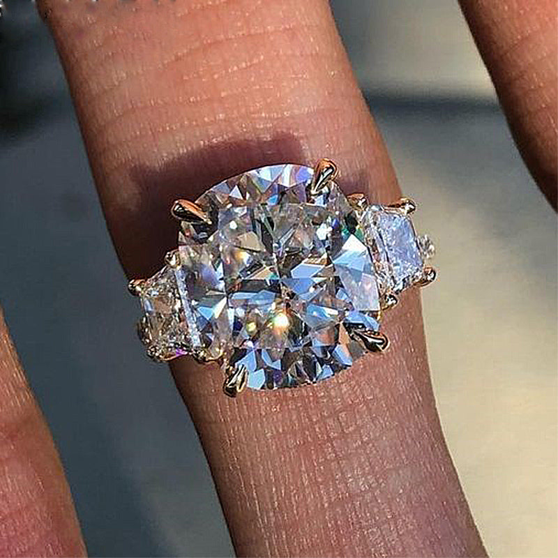 Noble Yellow Gold Cushion Cut Three Stone Engagement Ring