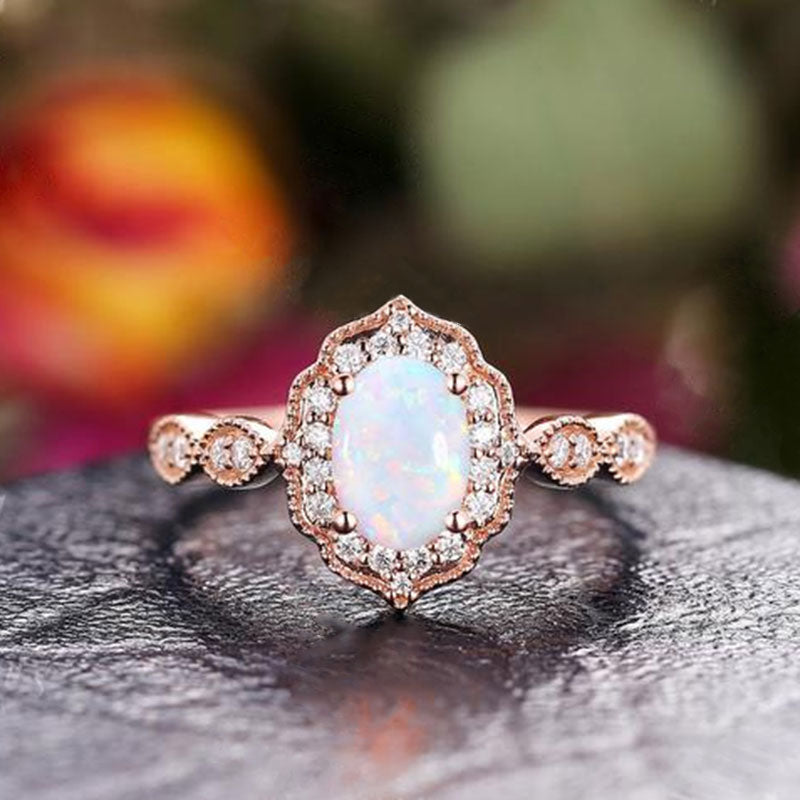 Vintage Rose Gold Oval Cut Opal Engagement Ring In Sterling Silver