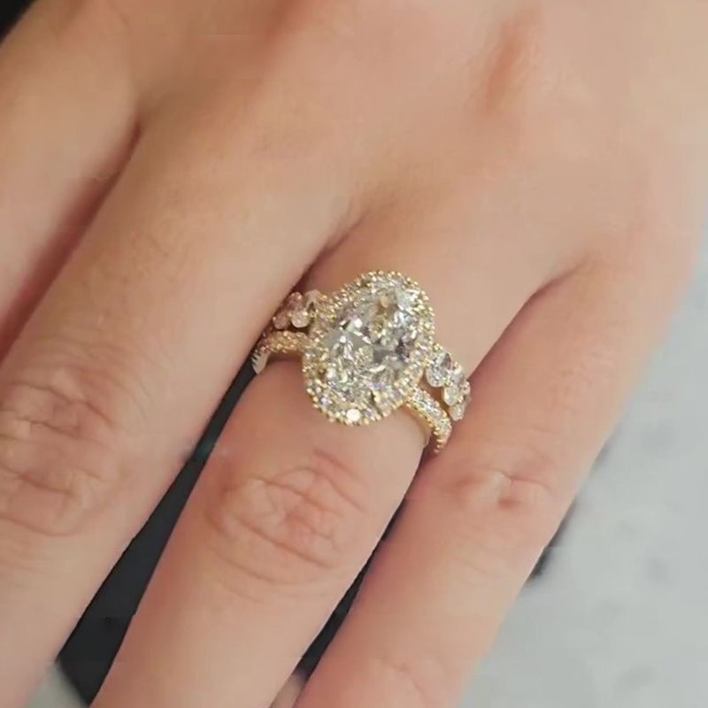 Maxine Yellow Gold Oval Cut Wedding Ring Set In Sterling Silver