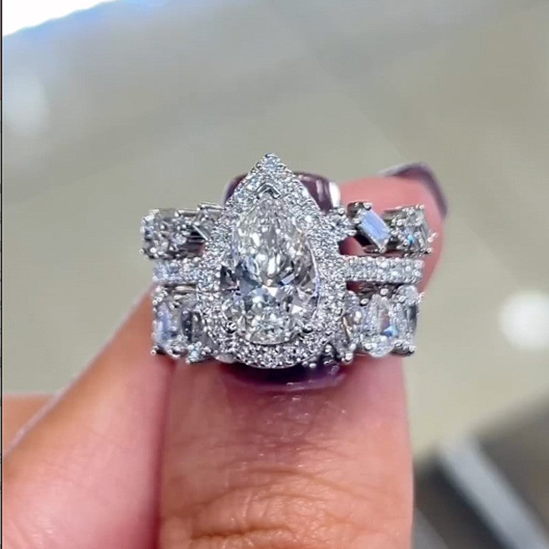 2.2 Carat Halo Pear Cut Wedding Ring Set With Two Luxurious Wedding Bands