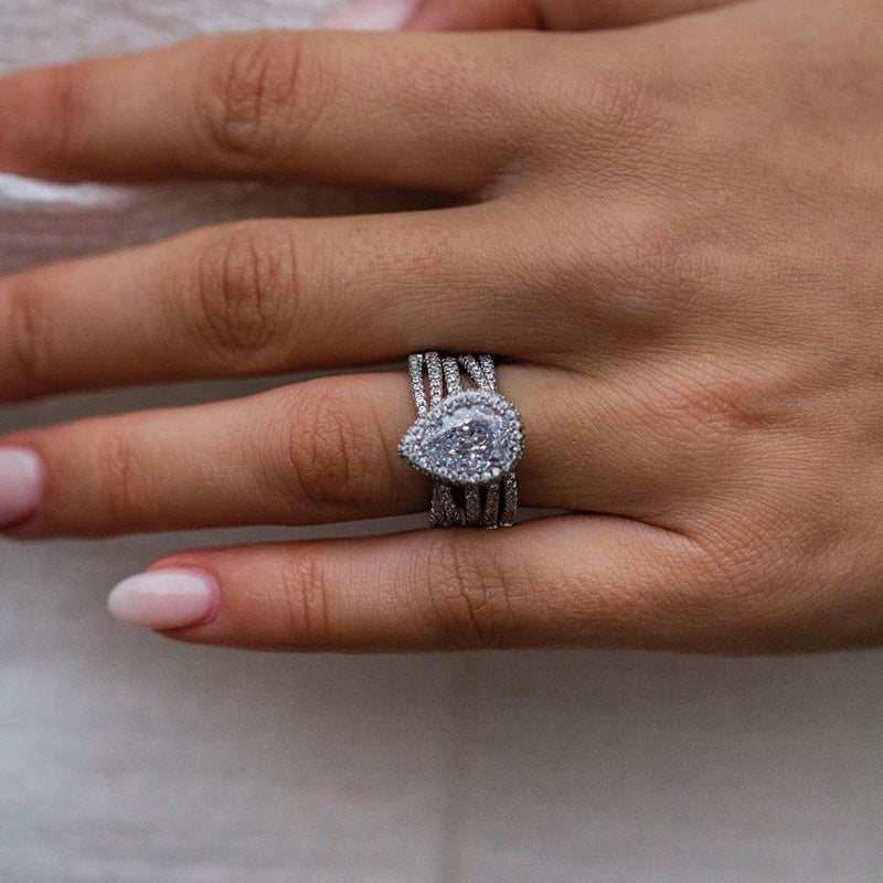 Classic Halo Pear Cut Insert Wedding Ring Set In Sterling Silver