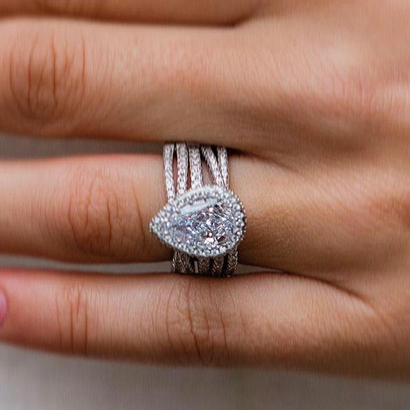 Classic Halo Pear Cut Insert Wedding Ring Set In Sterling Silver