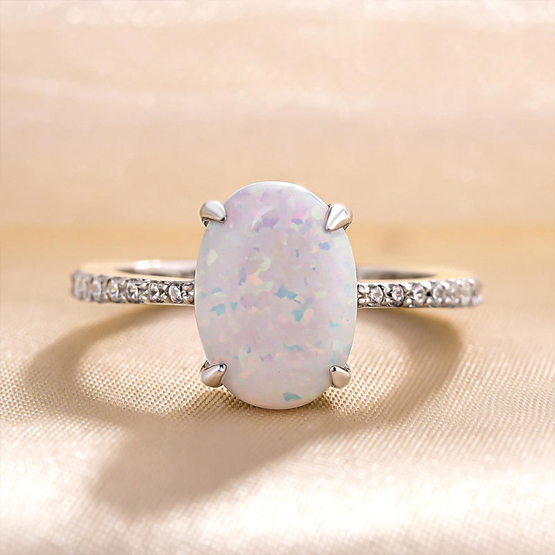 Elegant Oval Cut Opal Stone Engagement Ring In Sterling Silver