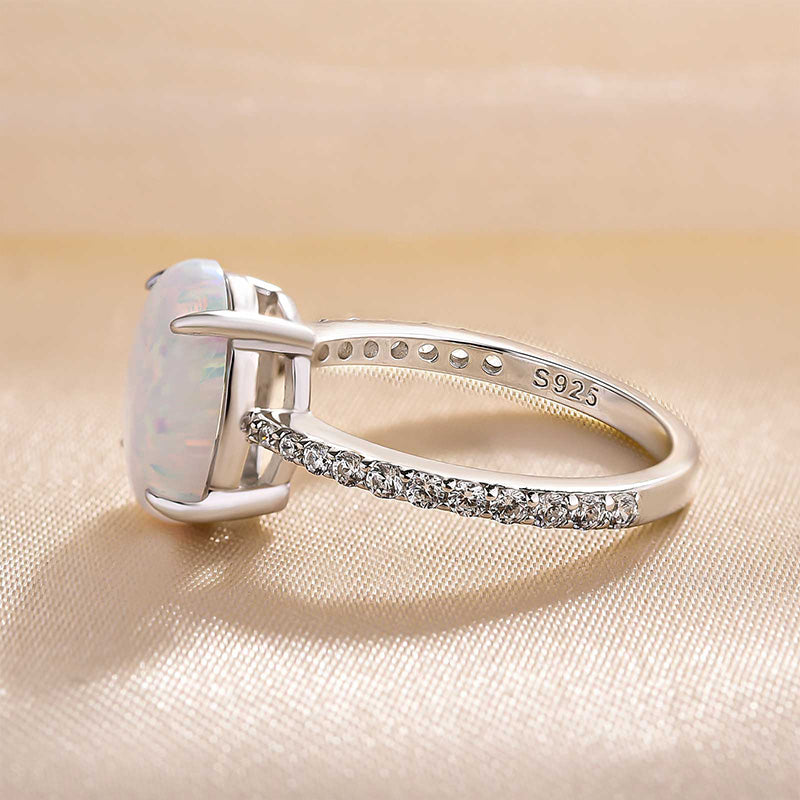 Elegant Oval Cut Opal Stone Engagement Ring In Sterling Silver