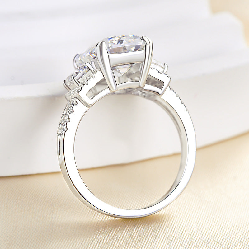 Lovely Split Shank Emerald Cut Three Stone Engagement Ring